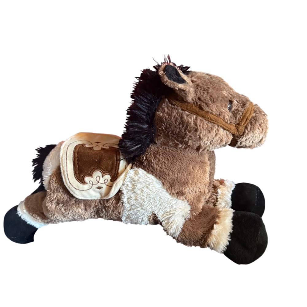 Brown And White Horse With Fabric Saddle